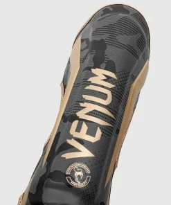 Venum Elite Shin Guards - Dark Camo/Gold 11 Venum Elite Shin Guards - Dark Camo/Gold -Boxing Sport Store SHINGUARD ELITE 3.0 BLACK GOLD 1500 02 2