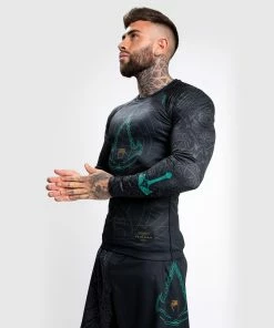 Venum Assassin's Creed Reloaded Rashguard - Long Sleeves - Black 14 Venum Assassin's Creed Reloaded Rashguard - Long Sleeves - Black -Boxing Sport Store b 252F1 252F8 252F4 252Fb184fdc4bae1967aff7e4130f7fdb1cccb155028 RASH LS ASSASSINSCREED BLACK 12