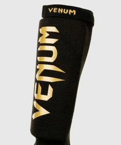 Venum Kontact Shin Guards - Black/Gold 11 Venum Kontact Shin Guards - Black/Gold -Boxing Sport Store b 252F6 252F4 252F0 252Fb640265cca2f0b7f5e700f63e4236d081bb7790c SHINGUARD INSTEP KONTACT BLACK GOLD SD 04