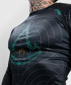 Venum Assassin's Creed Reloaded Rashguard - Long Sleeves - Black 17 Venum Assassin's Creed Reloaded Rashguard - Long Sleeves - Black -Boxing Sport Store d 252F6 252F9 252F1 252Fd69196937622a8317d8d28aceb66d01c46424d2d RASH LS ASSASSINSCREED BLACK 08